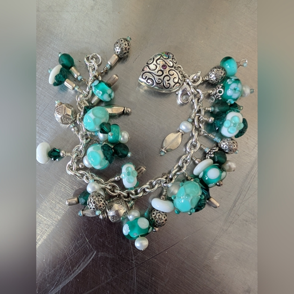 Bracelet  Charms Heart Charm That Opens With A Cluster Of Beads.